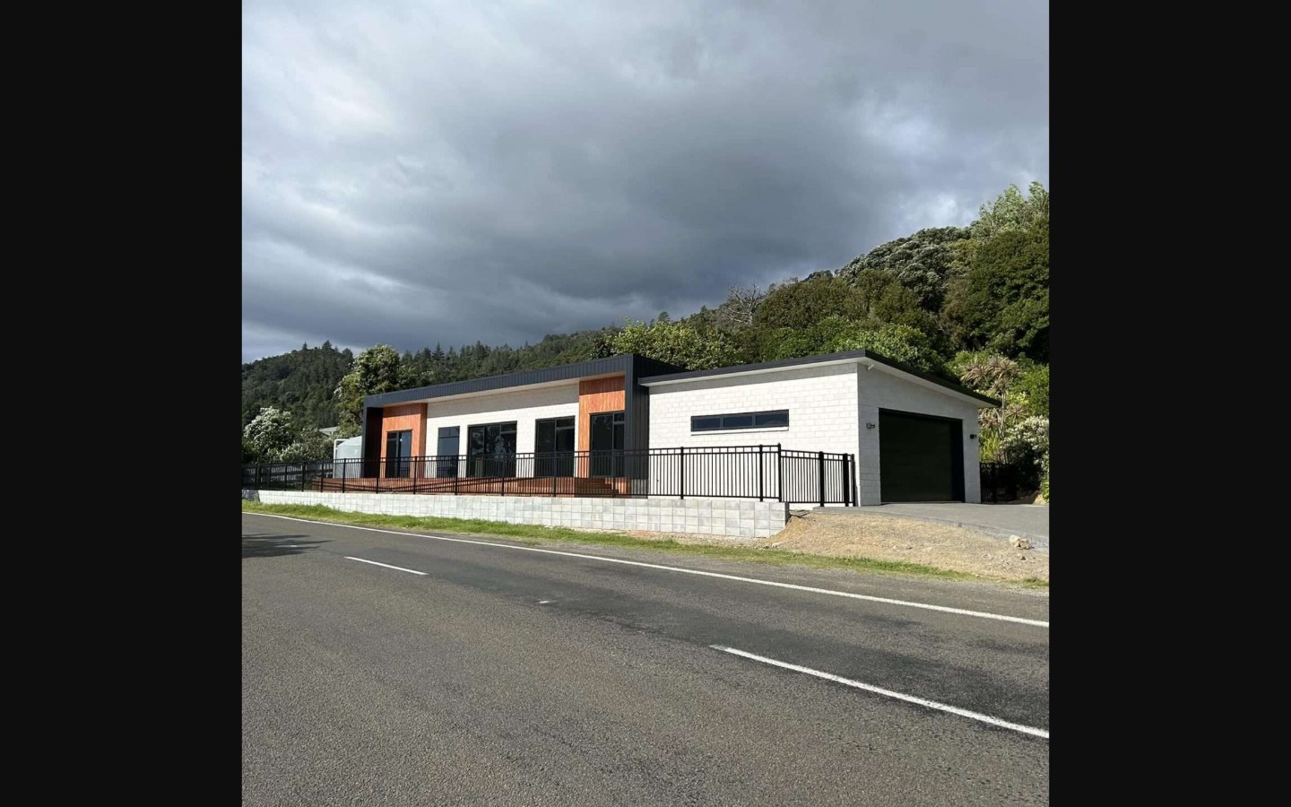 White and cedar home built by Paul Corr Builders